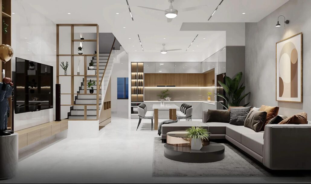 Phòng khách: Sử dụng bộ sofa chữ L tông xám trung tính, kết hợp cùng thảm dệt tinh xảo và ánh sáng dịu nhẹ từ đèn ray nam châm.
